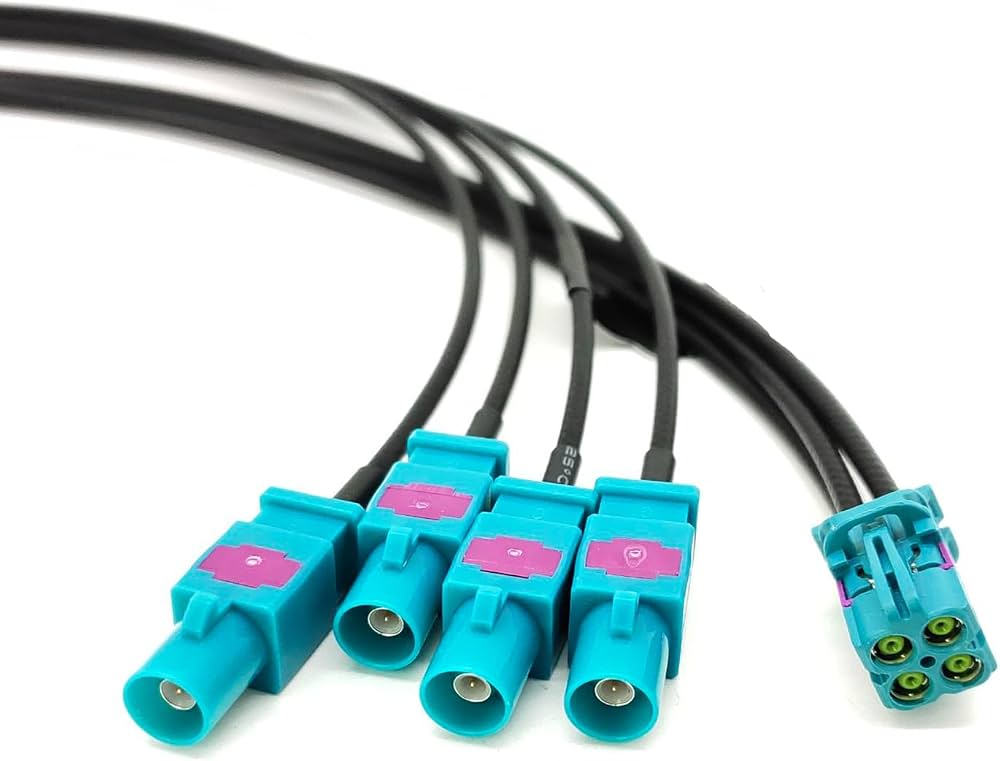 Automotive signal cable assembly with turquoise keyed connector housings