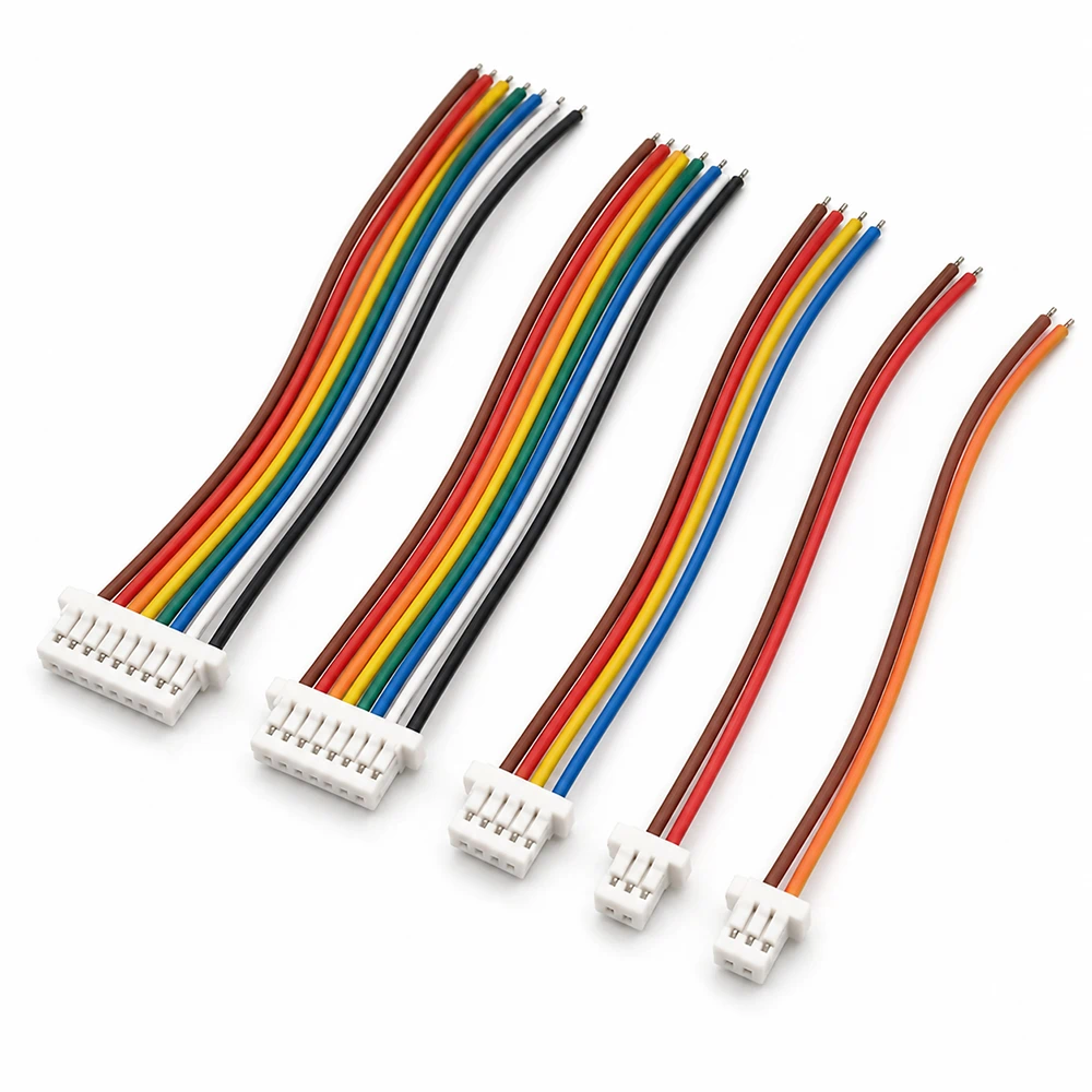 Colored terminal leads with white connector housings and prepared wire ends
